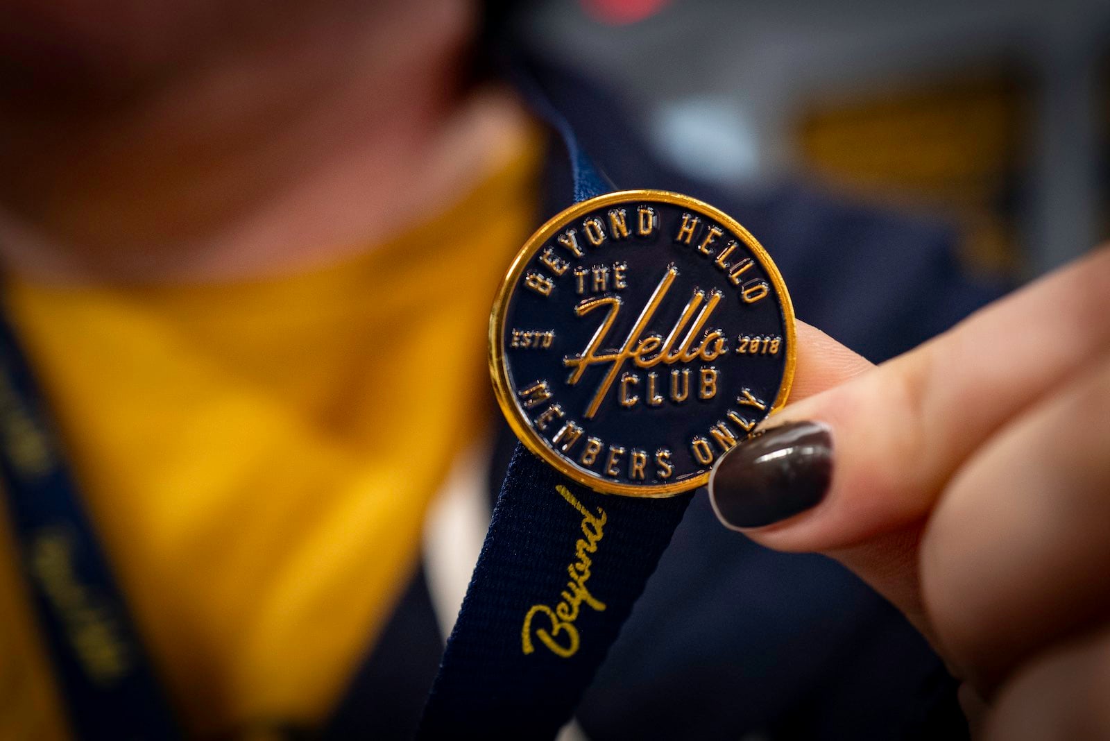 Beyond Hello customer with Hello Club loyalty card